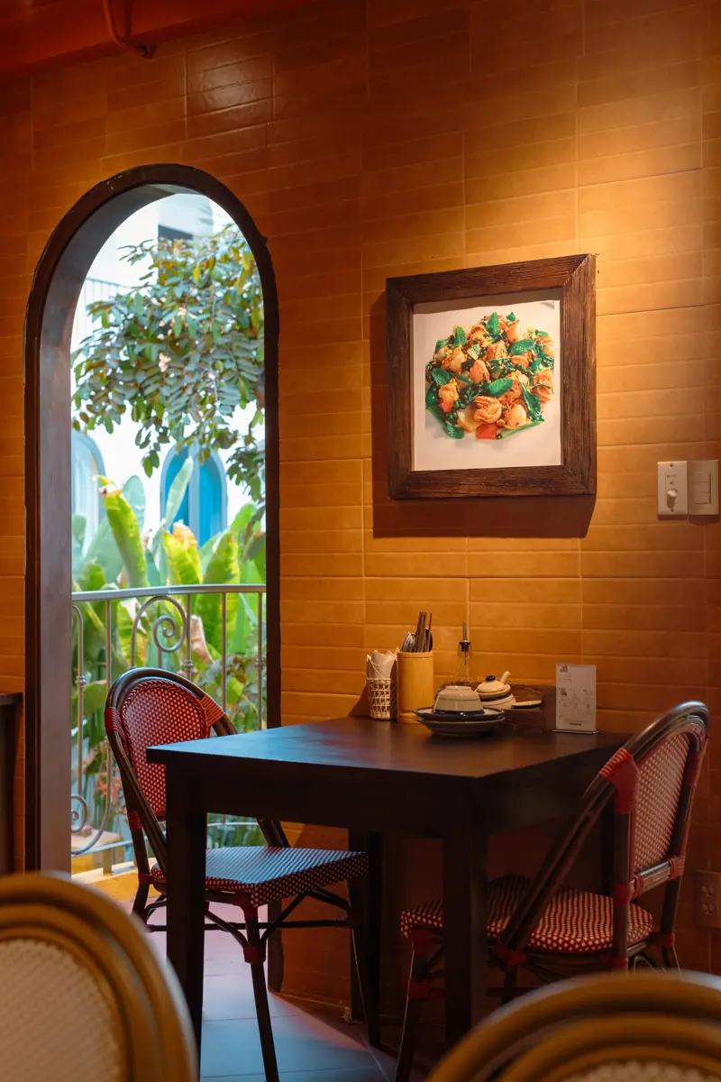 Table by the arched window